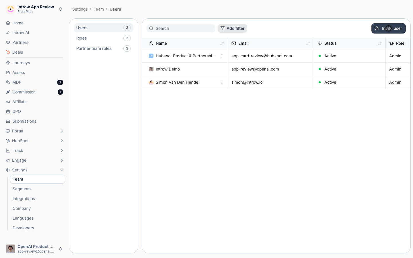 The Users tab lists everyone with their status, role, and invite date, with Invite user in the top right.