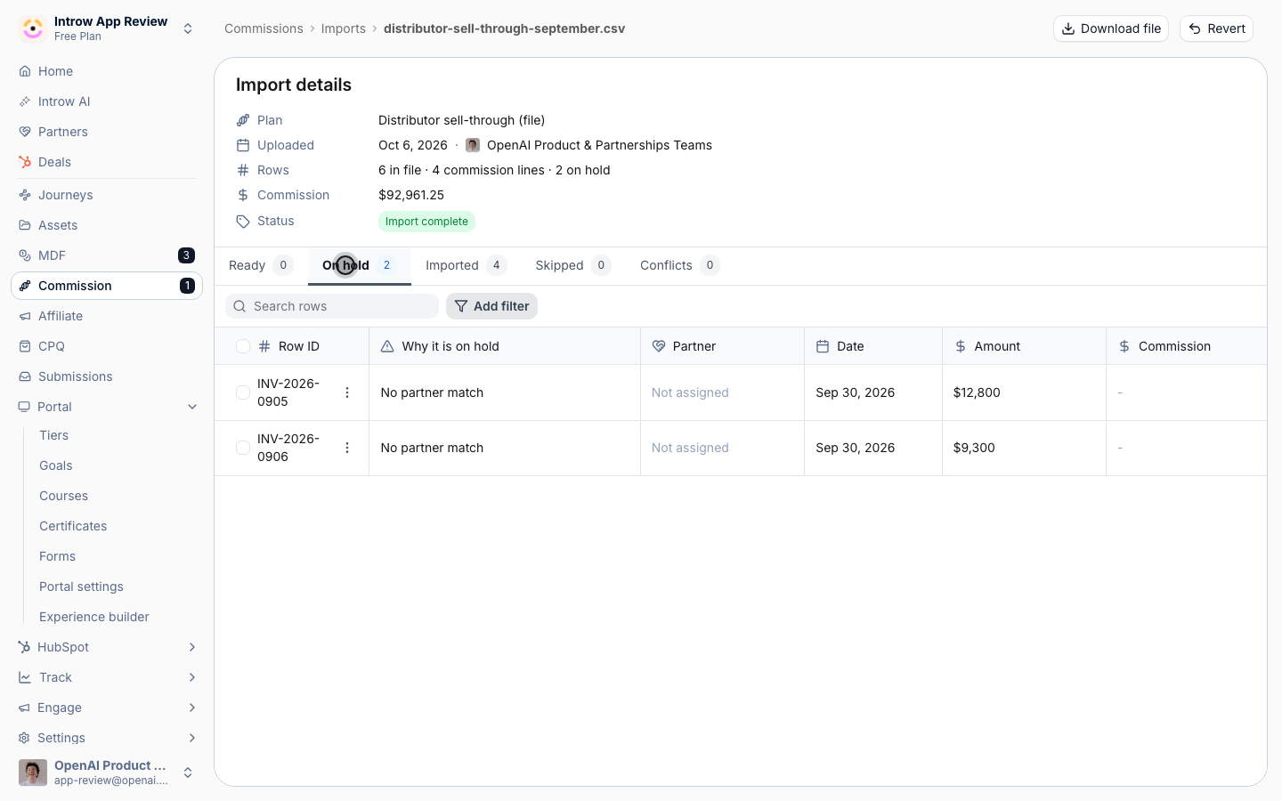 The import detail for distributor-sell-through-september.csv: 6 rows in the file, 4 commission lines, 2 on hold, status Import complete, and the On hold tab listing two rows with No partner match.