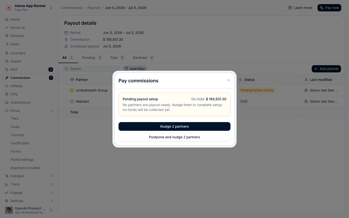 The Pay commissions dialog on a payout batch: the partners still under Pending payout setup, and the reminder that gets them verified, before any invoice is issued.