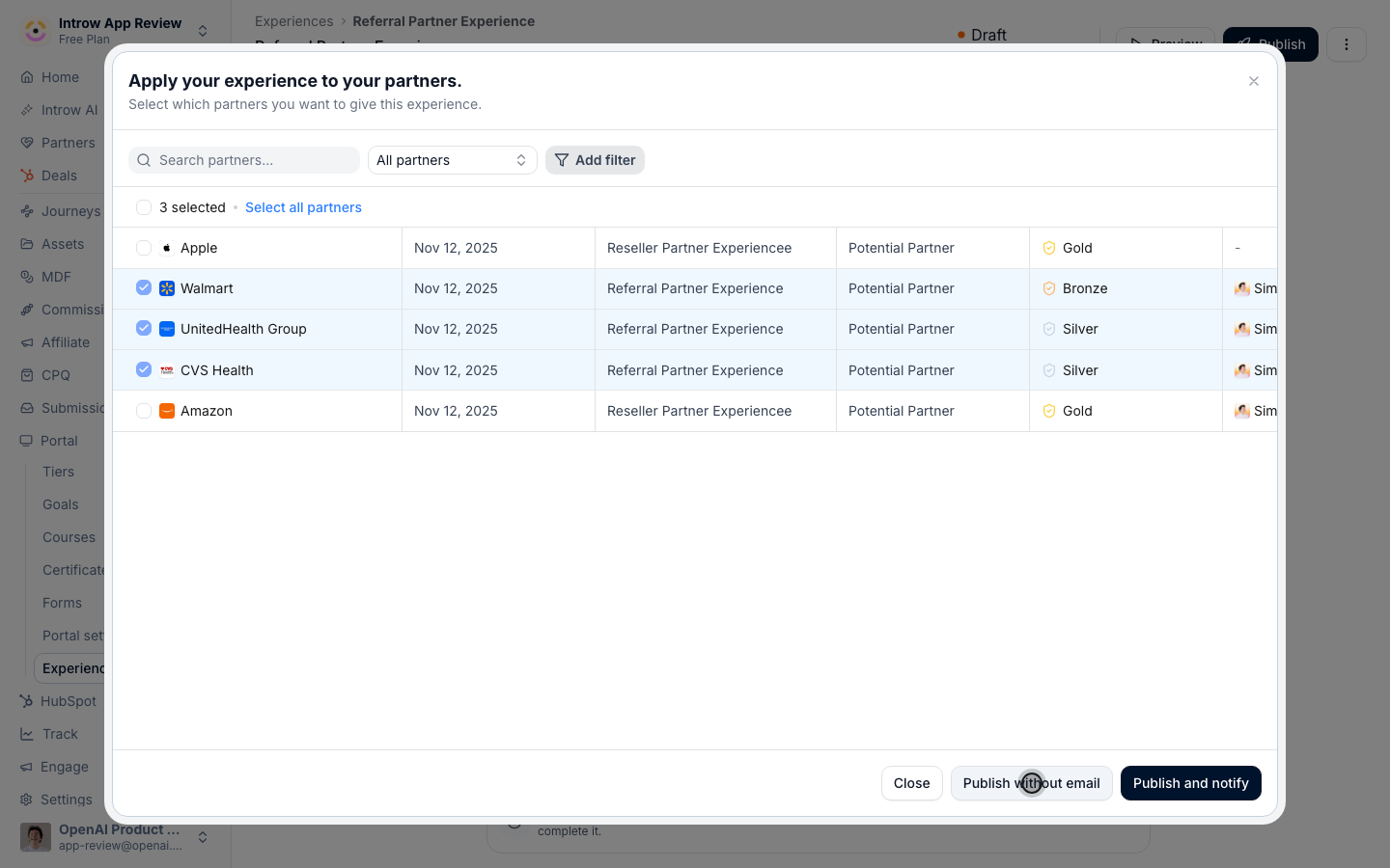 The Publish dialog with the three partners on the Referral experience selected, and Publish without email next to Publish and notify.