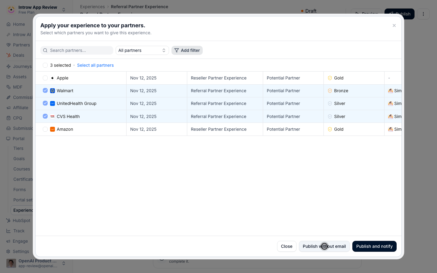The Publish dialog with the three partners on the Referral experience selected, and Publish without email next to Publish and notify.