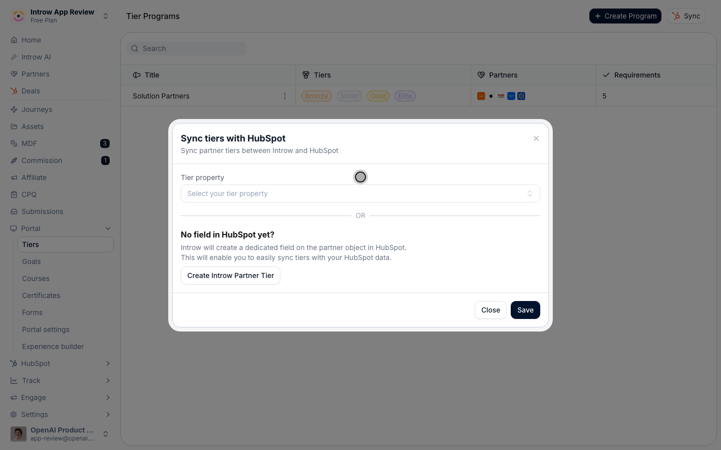 Choose the CRM property that stores each partner's tier. On HubSpot, Introw can create the field for you.