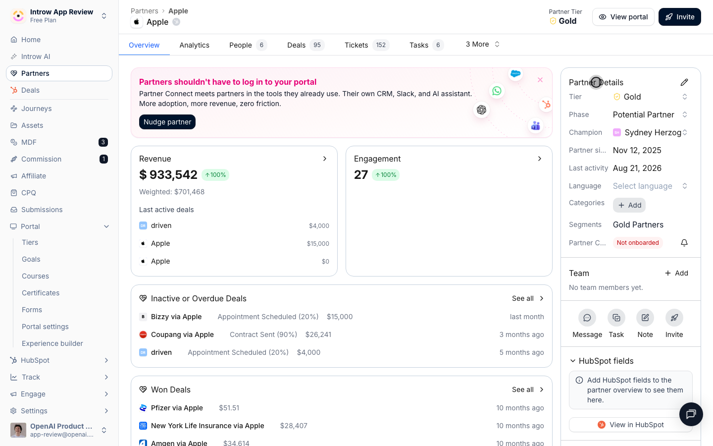 The Partner Details card holds tier, phase, champion, currency, and language: the fields that drive their experience.