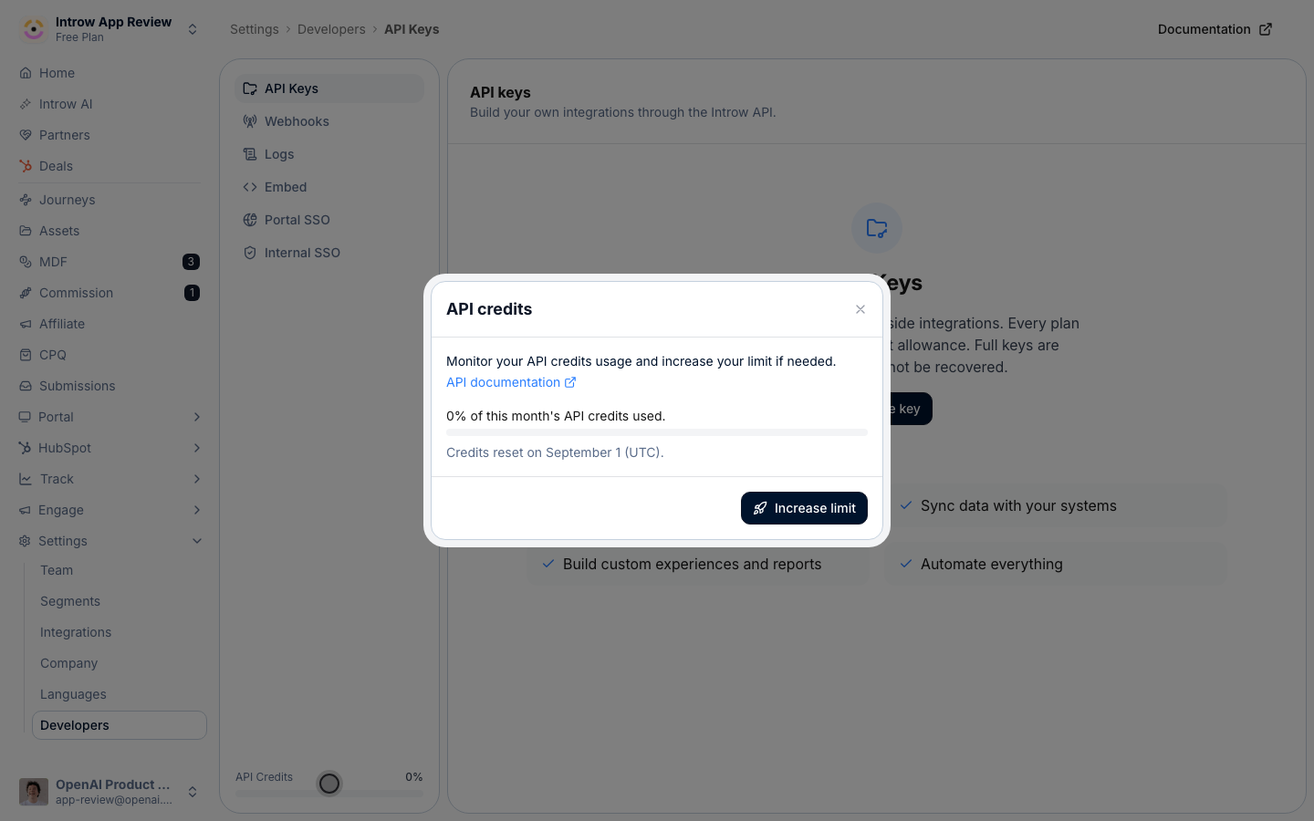 The API credits dialog open over the API keys page, showing the share of this month's allowance used and the date credits reset, with the API Credits bar at the bottom of the Developers sidebar